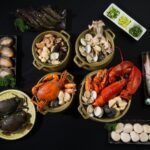 嘉義西區海鮮餐廳 生米慢熬活體紅蟳砂鍋粥 百元起享受濃鮮海味